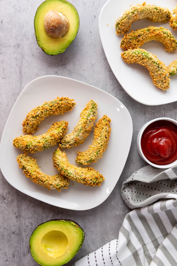 Serving the avocado fries with dipping sauce
