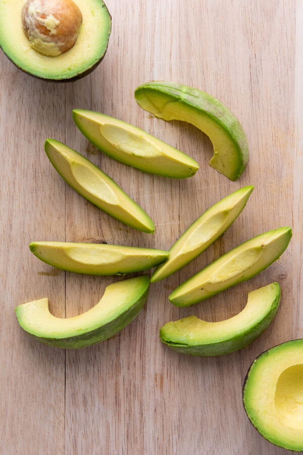 Avocado slices on a table