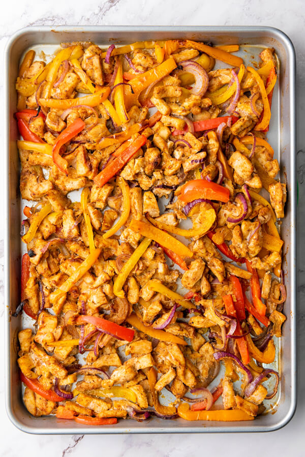 Chicken and veggies after being baked for 30 minutes