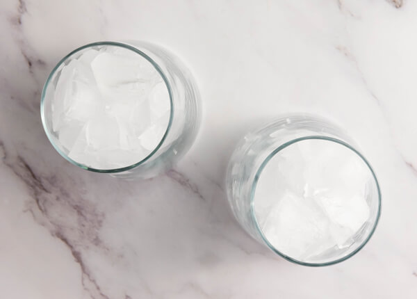 Two cups filled with ice