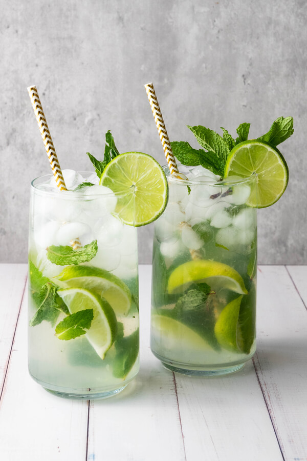 Garnishing the fauxjito with a couple of lime slices and a sprig of mint