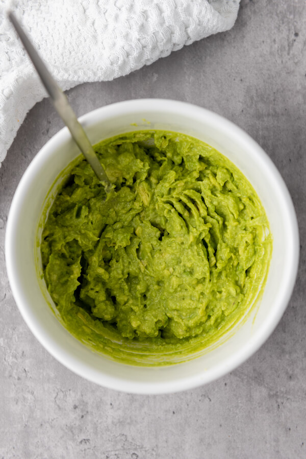 Mashing the avocados