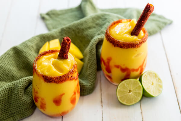 2 glasses filled with Mangonada