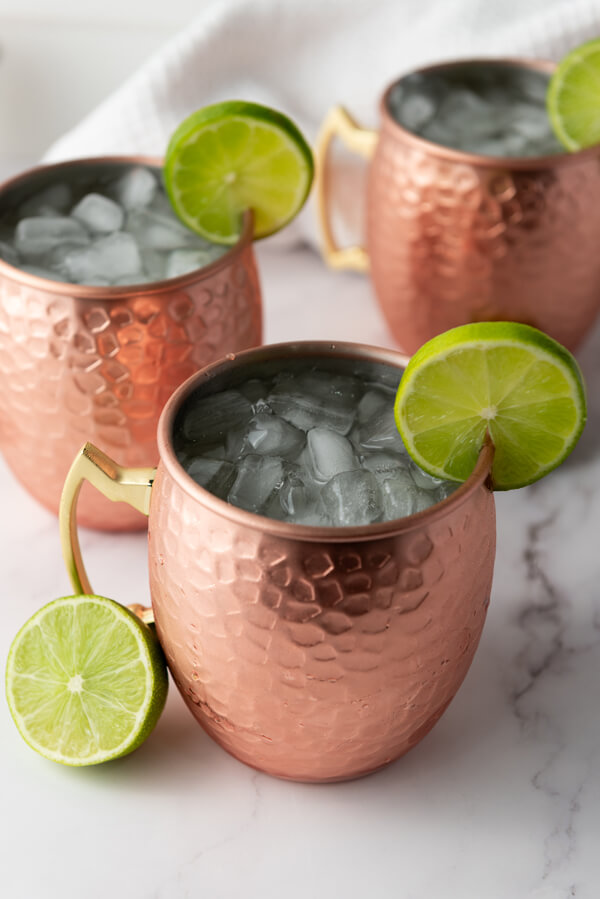 Serving 3 Moscow Mule with lime wheels