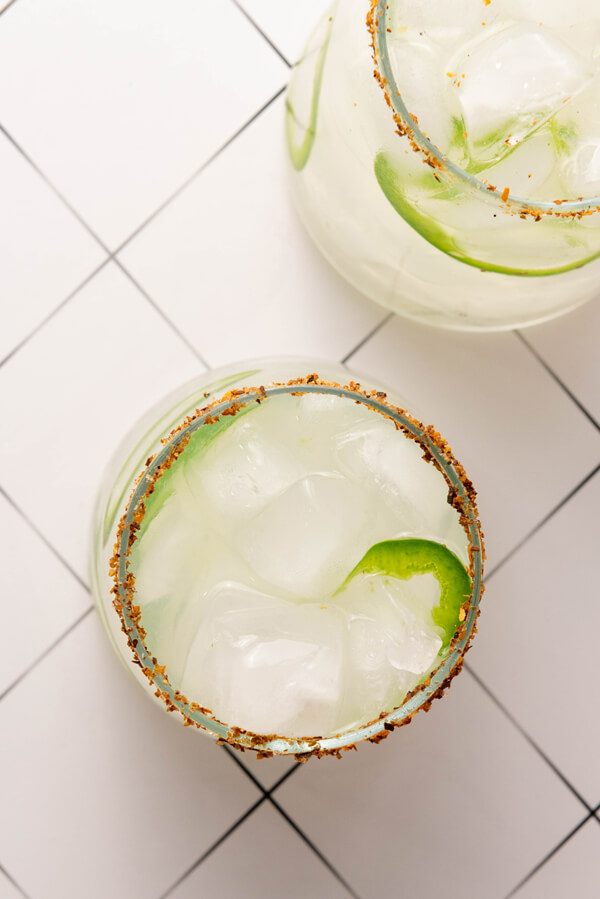 Serving the spicy margarita on a glass