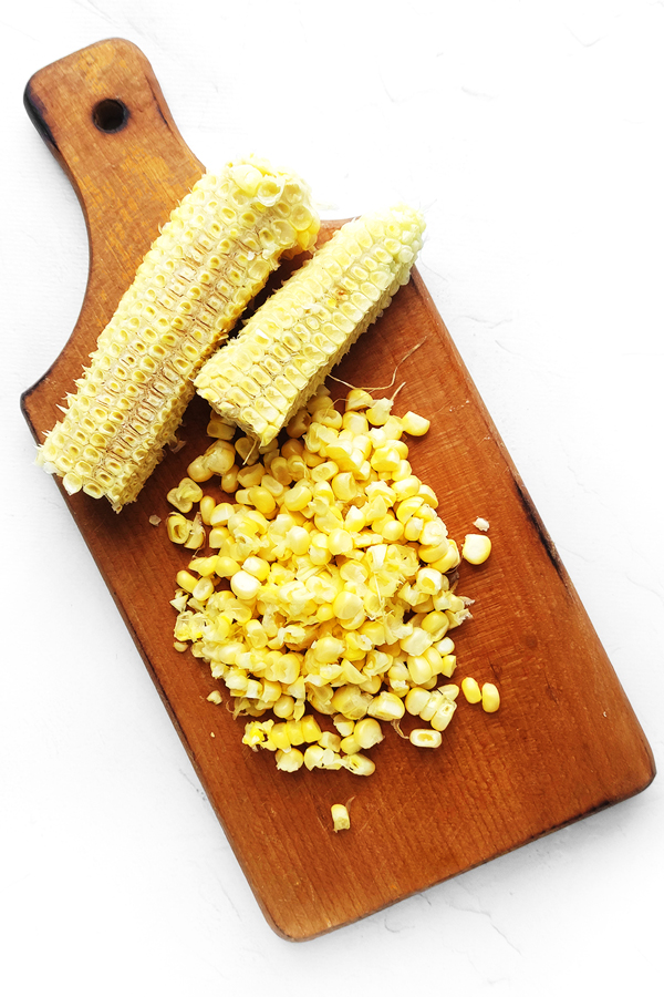 Removing the kernels from the cobs