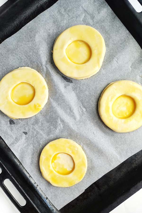 Brushing the pastry with the egg wash