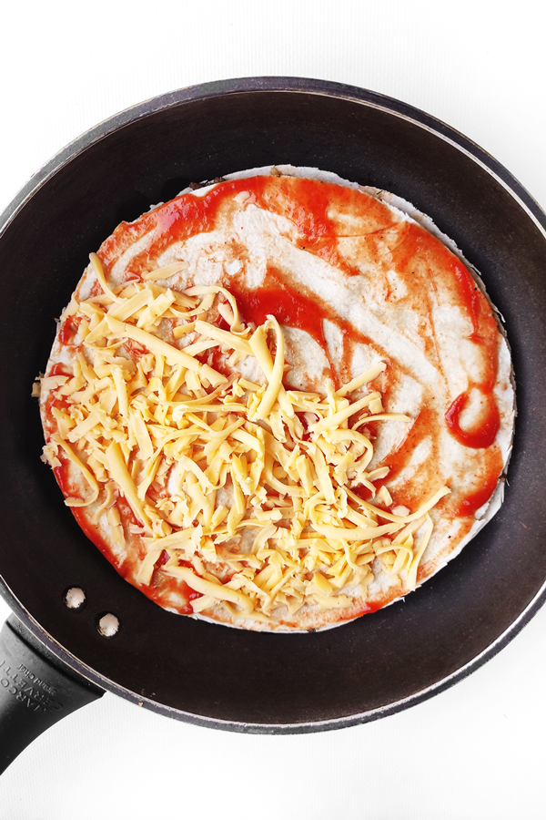 Adding tomato paste and cheese