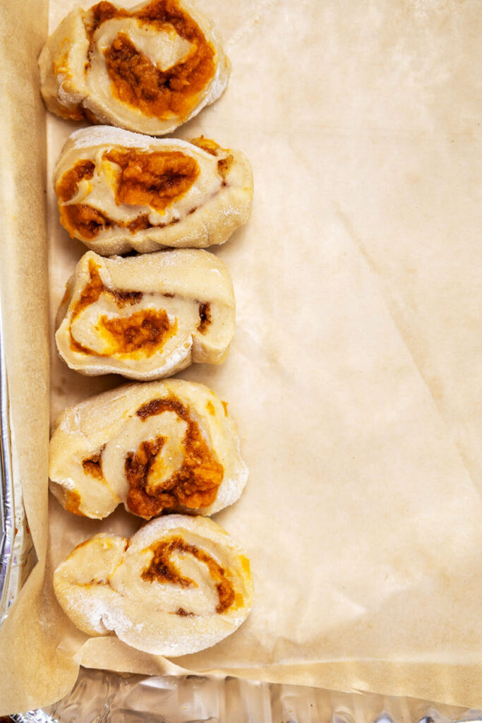 Placing the rolls into a pan
