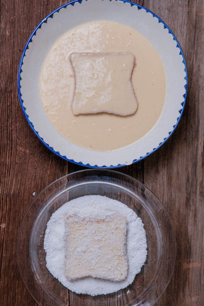 Covering the bread with shredded coconut 