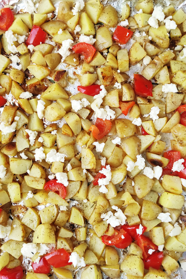 Mixing in the spices and feta cheese