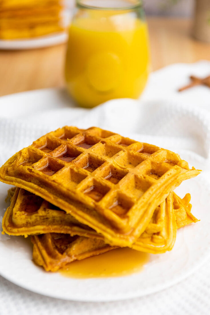 Serving Pumpkin Waffles with maple syrup