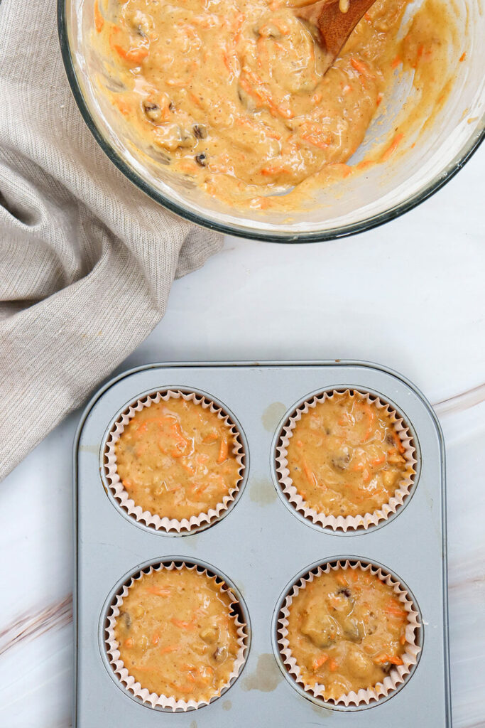 Dividing batter evenly into muffin cups