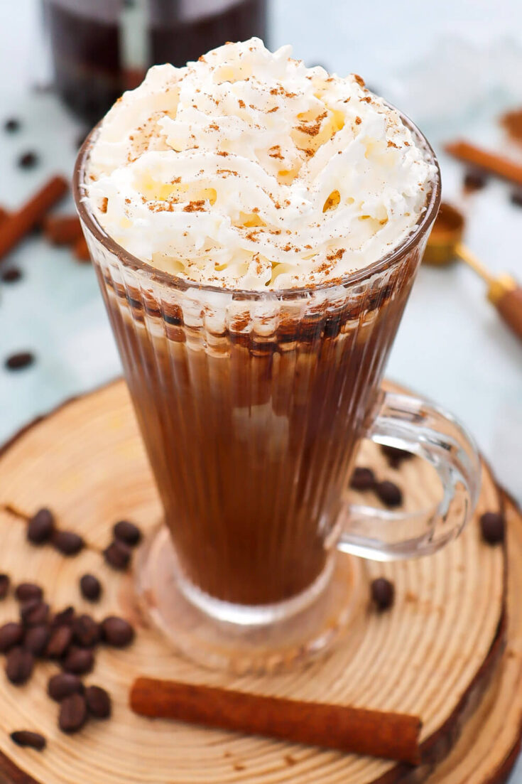 Serving Cinnamon Dolce Late with whipped cream and a sprinkle of cinnamon