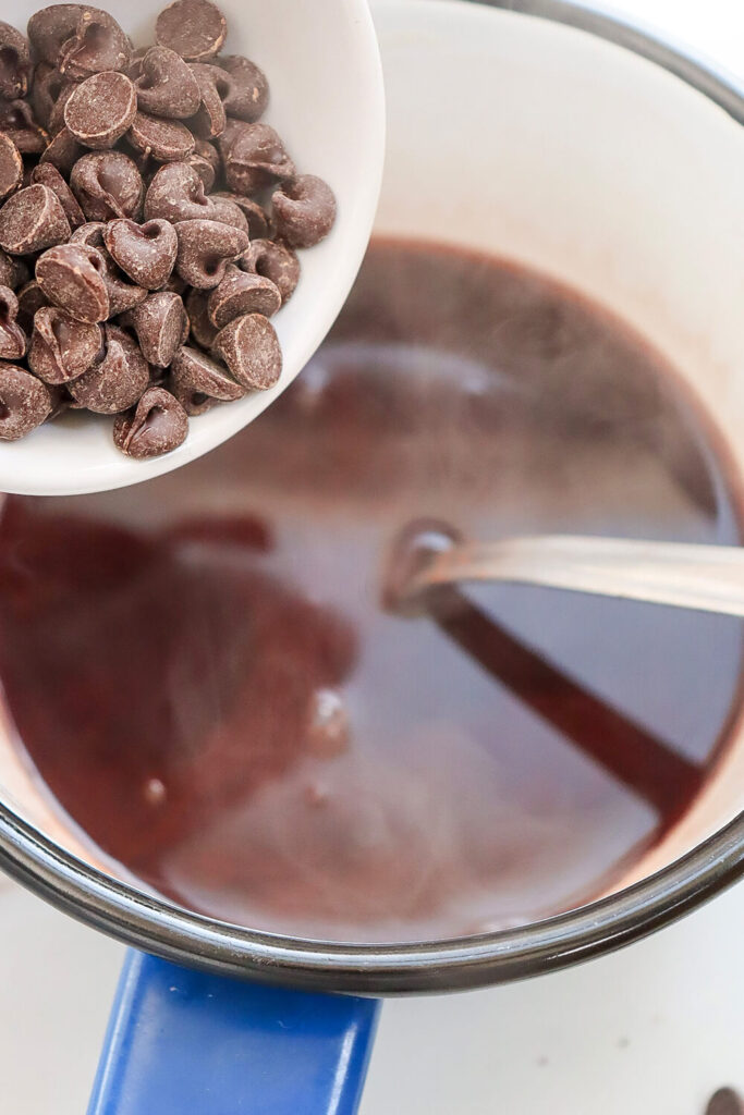 Adding chocolate chips
