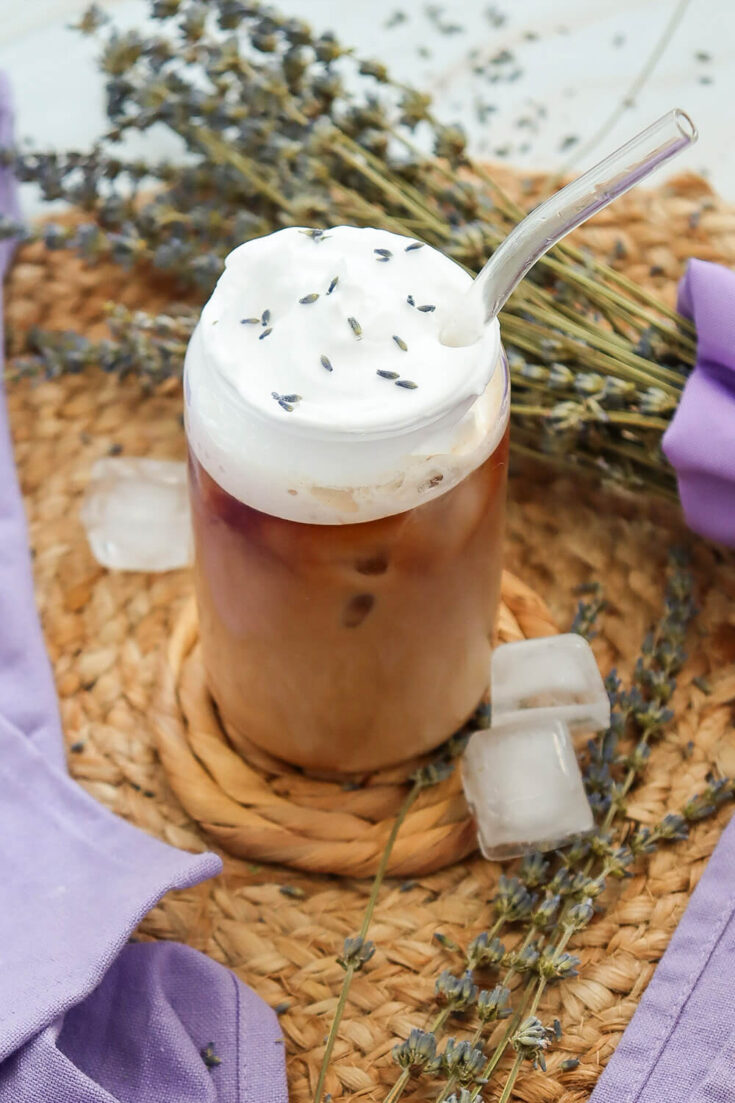 Serving the Lavender Vanilla Iced Coffee with whipped cream and lavender