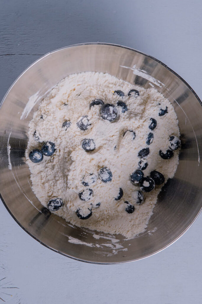 Adding the blueberries in the flour mixture