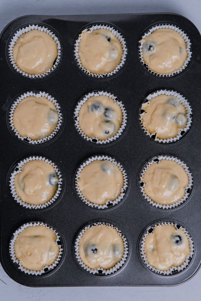 Filling the 12 muffin cups