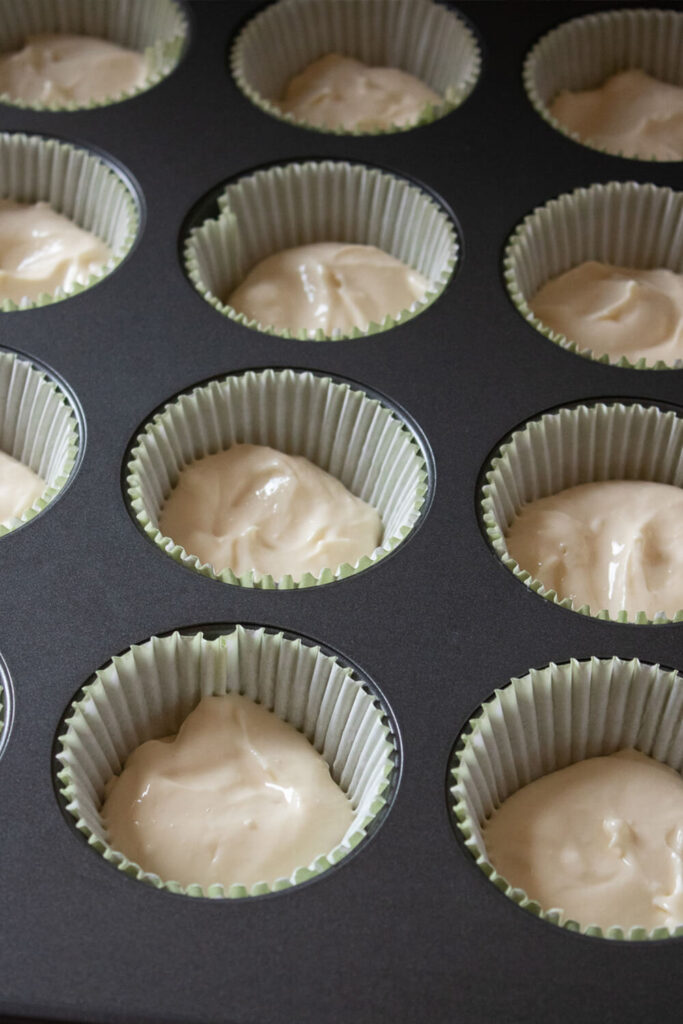 Dividing the mixture into the muffin cups