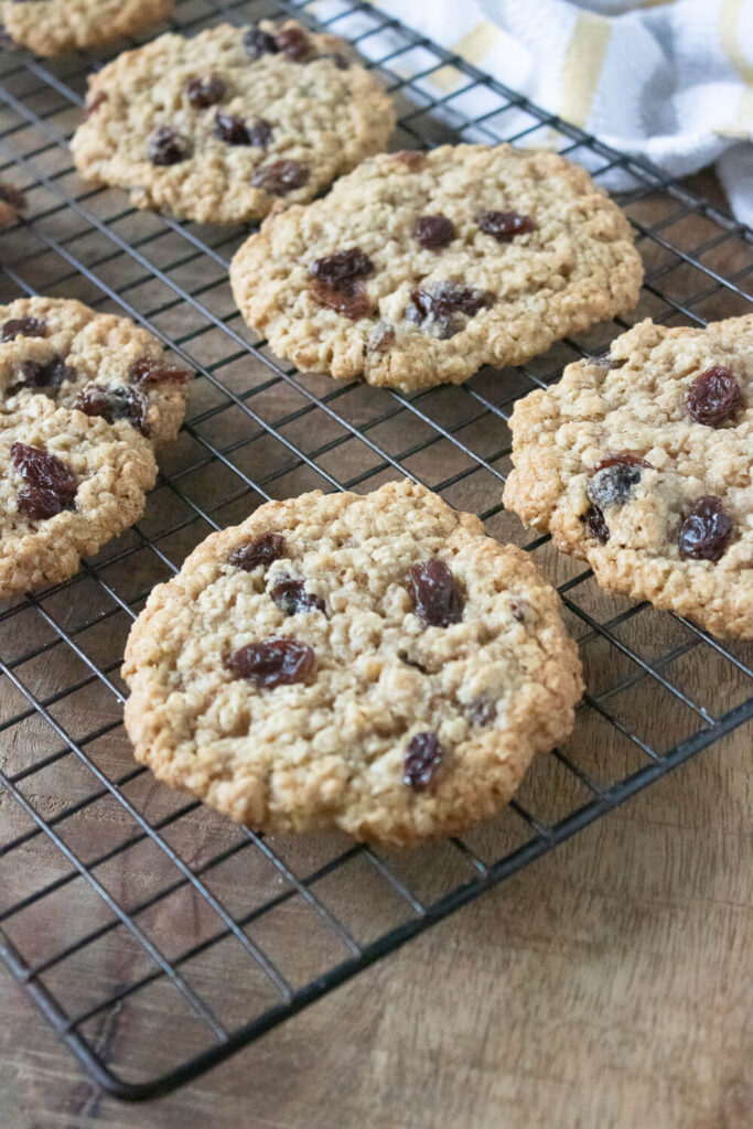 Letting the oatmeal raisin cookies cool on a wire rack