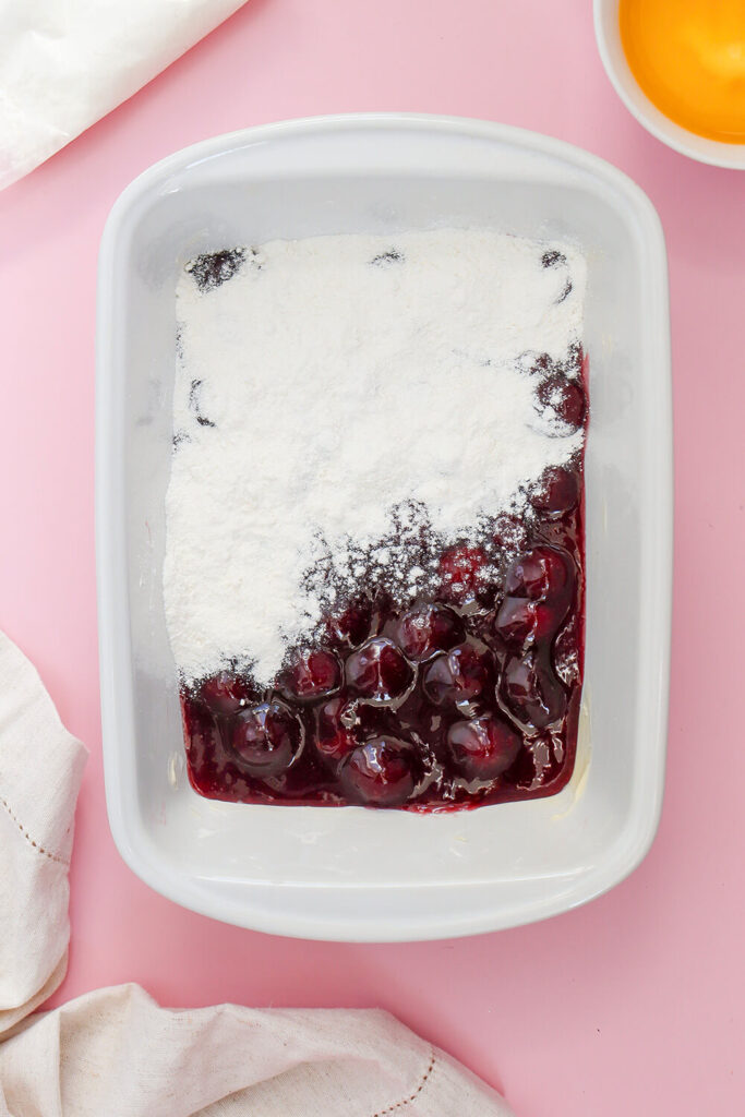 Adding the dry cake mix 
